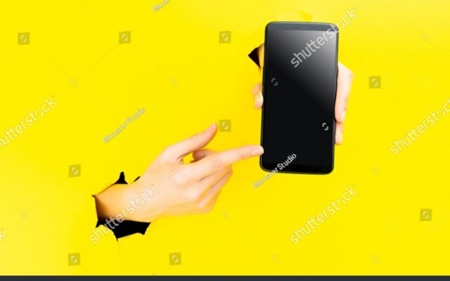 stock photo banner with a phone in hand on yellow background and copy space empty space for text design 2081066488 Adminum Bloc